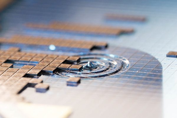 Multiple dies arranged on a silicon wafer